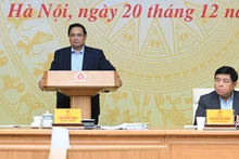 Le Premier ministre Pham Minh Chinh (debout) lors de la réunion. Photo : Tran Hai/NDEL.