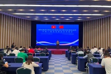 La conférence attire la participation de nombreuses entreprises vietnamiennes et chinoises dans le domaine des ascenseurs. Photo : baocongthuong