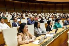 Députés lors de la 10e session de l'Assemblée nationale. Photo : VNA.