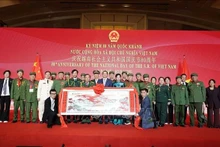 Des délégués lors cérémonie en Chine marquant le 80e anniversaire de la Fête nationale du Vietnam (2 septembre 1945 – 2 septembre 2025). Photo : VNA.