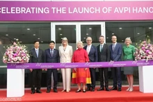 Lors de la cérémonie de coupure du ruban pour l'inauguration du bureau de représentation de l'Institut de politique Australie-Vietnam. Photo : baoquocte