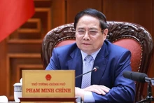 Le Premier ministre Pham Minh Chinh lors de la réunion, à Hanoi, le 28 juin. Photo : VGP.