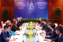 Séance de travail entre le ministre de la Sécurité publique, Luong Tam Quang et Ghada Waly, Sous-Secrétaire générale des Nations Unies et Directrice exécutive de l'UNODC. Photo : VNA.