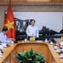 Le vice-Premier ministre Ho Quoc Dung présidant la réunion, à Hanoï, le 21 octobre. Photo : VNA.