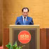 Le ministre de l’Agriculture et de l’Environnement, Trinh Viet Hung, présente les documents du gouvernement portant sur les orientations politiques relatives à la révision de la Loi foncière de 2024. Photo : Quochoi.