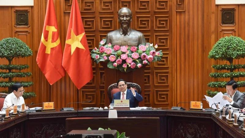 Le Premier ministre Pham Minh Chinh lors de la réunion. Photo : NDEL. 