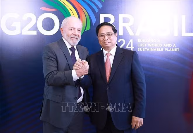 Le Premier ministre vietnamien Pham Minh Chinh (droite) et le président brésilien Lula da Silva. Photo : VNA.