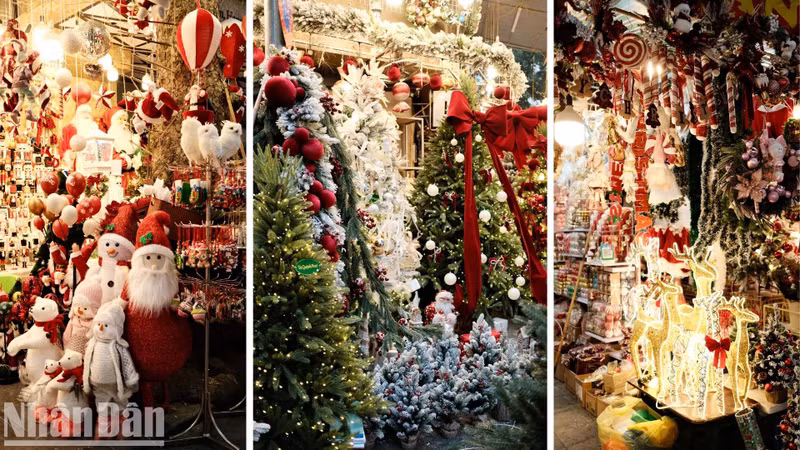 Dans la rue de Hang Ma, de nombreuses boutiques investissent dans la décoration pour attirer les clients. La rue se transforme en un petit village de Noël au cœur de Hanoï, devenant une destination attrayante pour les touristes, tant vietnamiens qu’étrangers. Photo : Trung Hieu/NDEL.