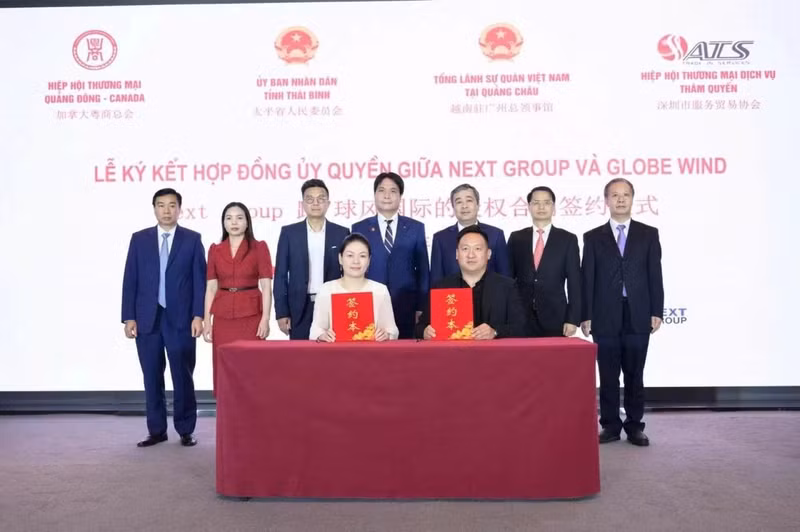 Signature d'un accord de coopération entre Next Group et Globe Wind. Photo: Consulat général du Vietnam à Guangzhou