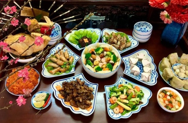 Le repas du réveillon est très recherché et traduit toute la subtilité de la gastronomie traditionnelle. Photo : afamly.vn