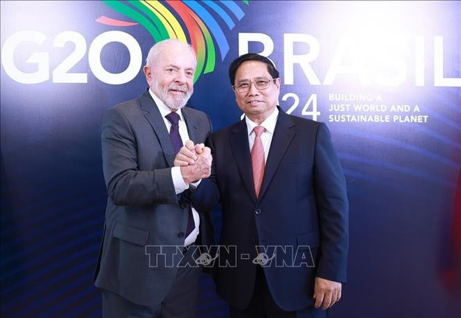Le Premier ministre vietnamien Pham Minh Chinh (droite) et le président brésilien Lula da Silva. Photo : VNA. Le Premier ministre vietnamien Pham Minh Chinh (droite) et le président brésilien Lula da Silva. Photo : VNA.