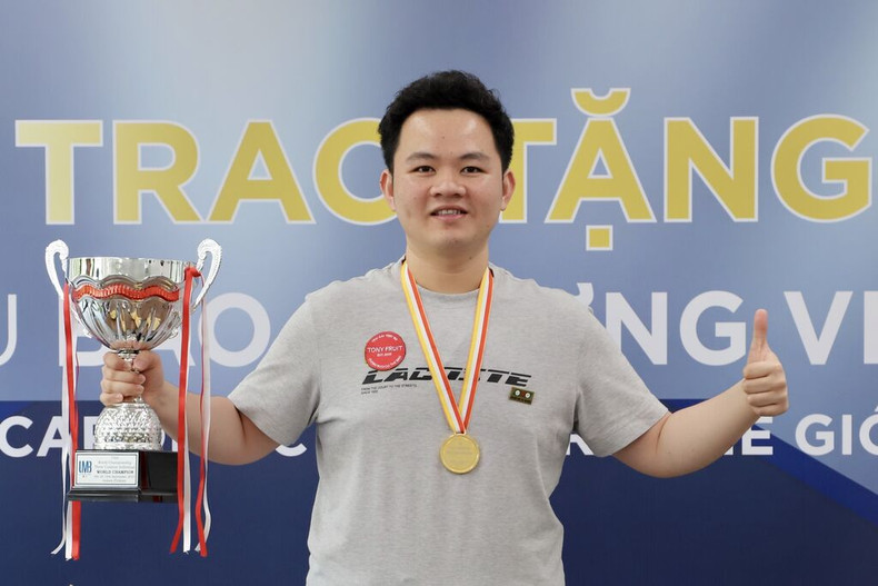 Bao Phuong Vinh, champion du monde de billard carambole à trois bandes. Photo : VNA. Bao Phuong Vinh, champion du monde de billard carambole à trois bandes. Photo : VNA.