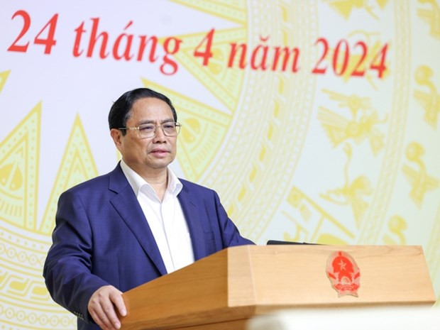 Le PM Pham Minh Chinh à la 8e réunion du Comité national pour la transformation numérique. Photo: VNA