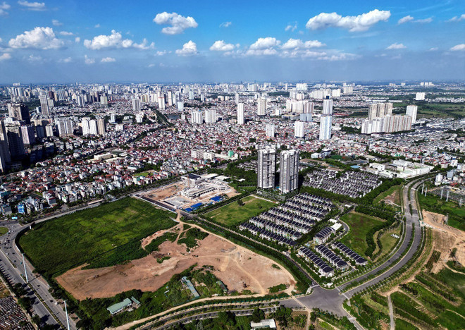 L&apos;Assemblée nationale (15e législature) a adopté le projet de Loi foncière (modifiée). Le marché immobilier se redresse progressivement avec de nombreux projets mis en œuvre. Photo : VNA.