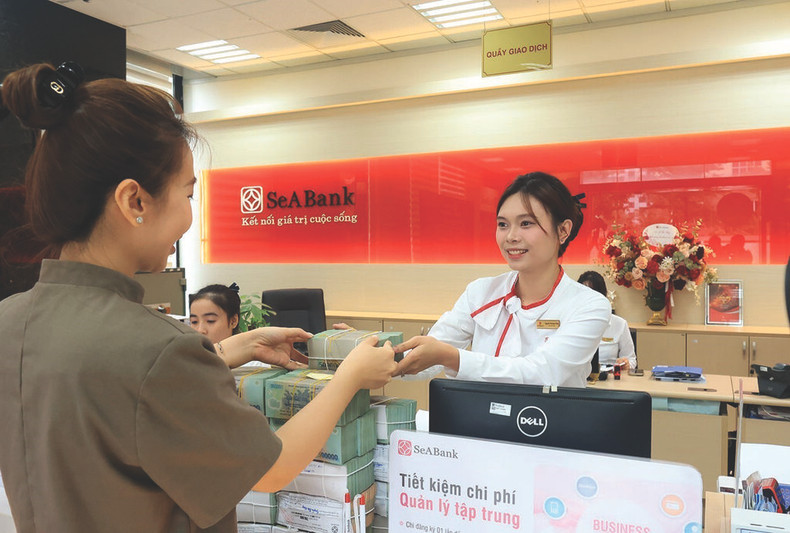 Les banques sont appelées à renforcer les prêts destinés à soutenir la production et les activités commerciales des entreprises à l’occasion de la Nouvelle Année lunaire 2025. Photo : VNA. Les banques sont appelées à renforcer les prêts destinés à soutenir la production et les activités commerciales des entreprises à l’occasion de la Nouvelle Année lunaire 2025. Photo : VNA.