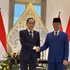 Le ministre vietnamien des Affaires étrangères, Le Hoai Trung (à gauche), et son homologue indonésien, Sugiono. Photo : VNA.