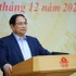 Le Premier ministre Pham Minh Chinh prend la parole lors de la conférence. Photo : VNA.