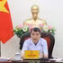 Le Premier ministre Le Minh Hung s'exprime lors de la réunion. Photo : VNA.