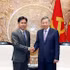 Le secrétaire général du Parti et président vietnamien, To Lam (à droite), reçoit le président de la Cour populaire suprême du Laos, Phayvy Syboualypha. Photo : VNA.