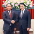 Le ministre vietnamien de la Sécurité publique, Luong Tam Quang (à droite), et le secrétaire d'État du ministère cambodgien de l'Intérieur, Santibindit Chan Ean. Photo : VNA.