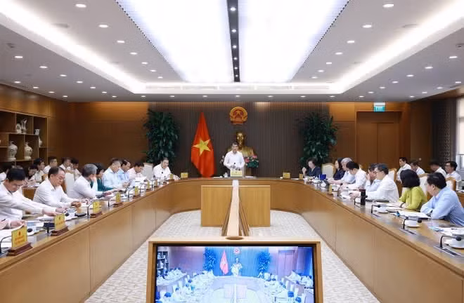 Vue d'ensemble de la séance de travail, à Hanoi, le 14 avril. Photo : VNA.