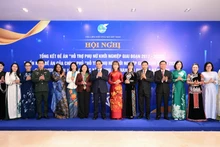 Le Premier ministre Pham Minh Chinh et les délégués participant à la conférence. Photo : nhandan.vn