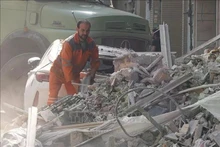 Bâtiments détruits après une frappe aérienne israélienne à Téhéran, en Iran, le 13 juin. Photo : Xinhua/VNA.