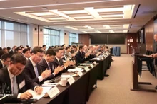 Le forum de promotion des investissements dans le Centre financier international au Vietnam. Photo : VNA