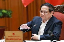 Le Premier ministre Pham Minh Chinh lors de la réunion, à Hanoi, le 1er juillet. Photo : VNA.