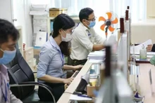 Le Vietnam prépare une réforme pour recruter experts et entrepreneurs dans le secteur public. Photo: nld.com.vn