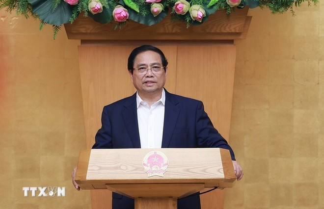 Le Premier ministre Pham Minh Chinh lors de la réunion. Photo: VNA Le Premier ministre Pham Minh Chinh lors de la réunion. Photo: VNA