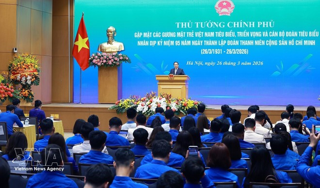 Le Premier ministre Pham Minh Chinh prononce un discours lors de la rencontre. Photo: VNA