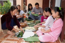 Le Têt est le moment où toute la famille se réunit pour vivre l’ambiance chaleureuse et festive. Photo: Duy Khanh/NDEL.
