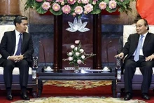 Le Président du Vietnam, Nguyên Xuân Phuc (à droite), et Xayxana Khotphouthone, président du Parquet populaire suprême du Laos en visite de travail au Vietnam. Photo : VNA.