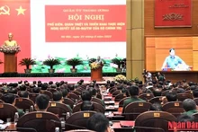 Le Premier ministre Pham Minh Chinh prend la parole lors de la conférence. Photo : Trân Hai/NDEL.