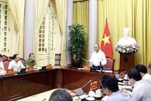 Le Président du Vietnam, Nguyên Xuân Phuc, prend la parole lors de la réunion. Photo : VNA.