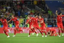 Les footballeurs anglais célèbrent leur victoire. Photo : FIFA.