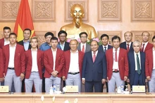 Rencontre entre le PM Nguyên Xuân Phuc et des représentants de la délégation vietnamienne aux ASIAD 2018. Photo : VGP.
