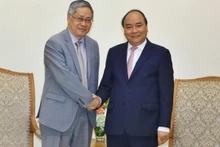Prenant la parole lors de la réception, Le PM Nguyên Xuân Phuc (à droite) et le directeur exécutif du Secrétariat de la Commission du Mékong, Pham Tuân Phan. Photo : VNA