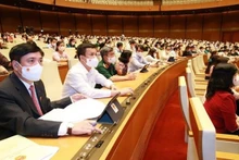 Les députés approuvent la résolution sur le nombre de membres du gouvernement. Photo: VNA.