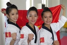 Le trio féminin de taekwondo du Vietnam, Châu Tuyêt Vân, Nguyên Thi Lê Kim et Nguyên Thuy Xuân Linh. Photo: VNA.