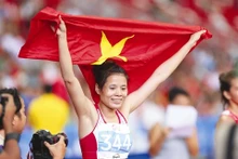Nguyên Thi Huyên a battu le record des SEA Games en 400m haies dames, grâce à un chrono de 56’15’’. Photo: Quôc Khanh/VNA/CVN.