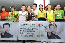 Les supporteurs accueil l'équipe de tir à pistolet. Photo: tdtt.gov.vn.