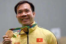 Hoàng Xuân Vinh restera dans l'histoire comme le premier champion olympique vietnamien. Photo: VGP.