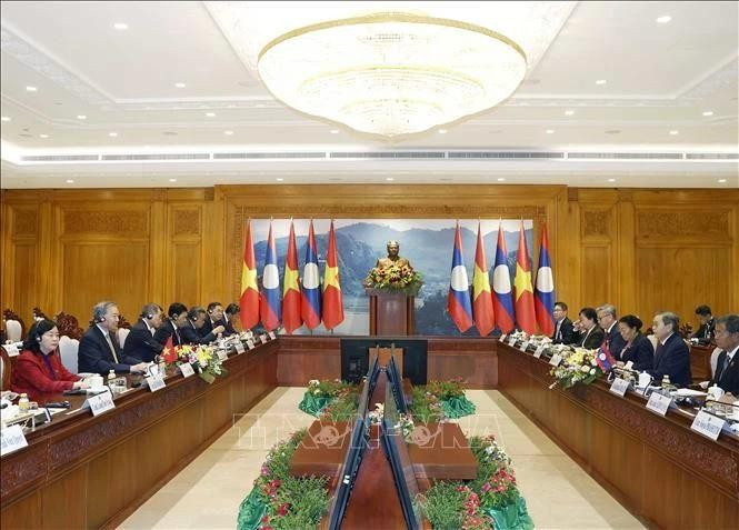 La rencontre entre le secrétaire général du PCV, To Lam, et le président de l’Assemblée nationale lao, Saysomphone Phomvihane. Photo : VNA.