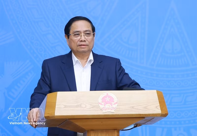 Le Premier ministre Pham Minh Chinh s'exprime lors de la conférence. Photo : VNA.