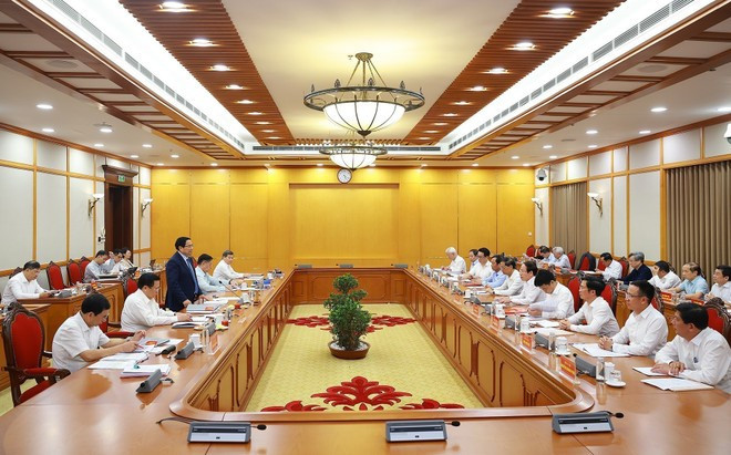 Lors de la séance de travail. Photo : VNA. chinh-2.jpg