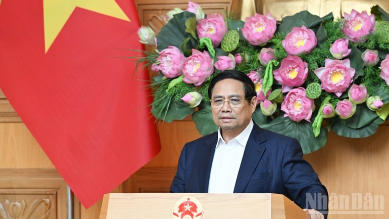 Le Premier ministre Pham Minh Chinh prend la parole lors de la séance de travail. Photo : NDEL. image-28.jpg