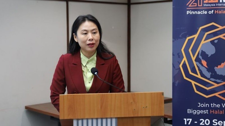Ho Thi Quyen, directrice adjointe de l'ITPC prend la parole lors du séminaire. Photo : NDEL. image-1-445.jpg