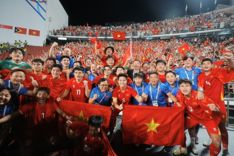 Les joueurs du Vietnam U22 exultent après leur victoire. Photo : VNA.
